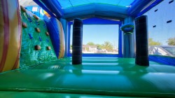 20240530 163959 1717263837 T-rex bounce house water slide combo